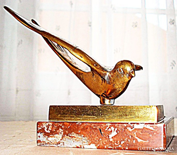 Hagenauer-style bronze sculpture depicting a swallow, leaf weight.