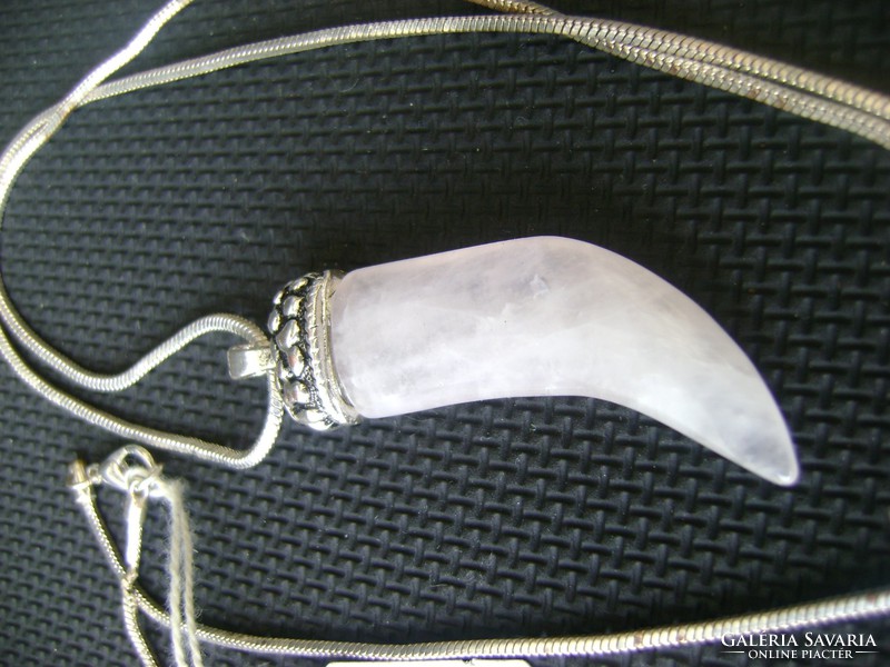 A huge rose quartz pendant with a gift necklace