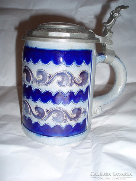 Stone-glazed, antique jug with porcelain lid