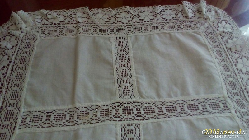 Delicate thin batiste tablecloth with rich lace decoration, 35 x 48 cm