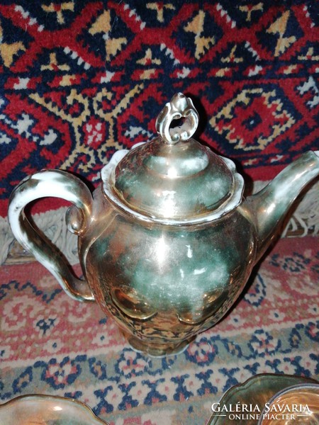 I am offering for sale an antique very fine porcelain coffee set, gilded
