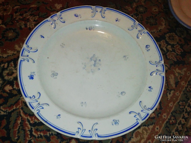 I am offering for sale an antique porcelain offering with blue flowers