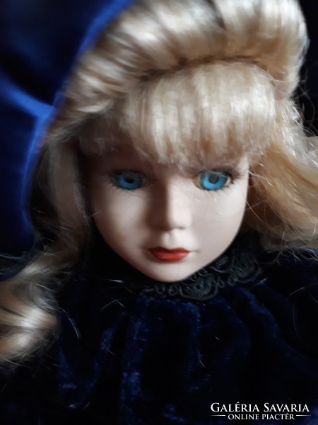 The old porcelain doll's 38cm flawless dress is also old, rare and beautiful