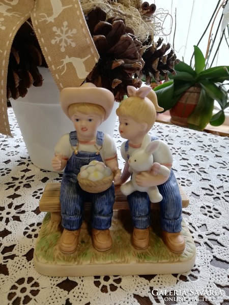 Porcelain Easter toddlers in jeans