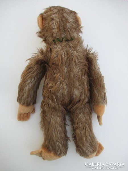 Older monkey toy figure