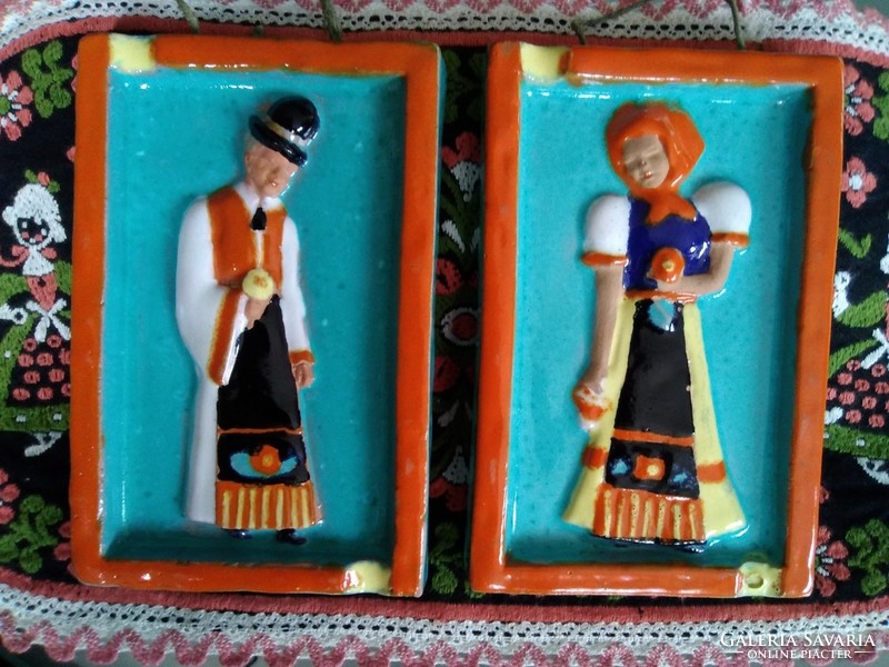 Jolán Szécsi's wall-hanging ceramic pictures in folk costume, with markings.