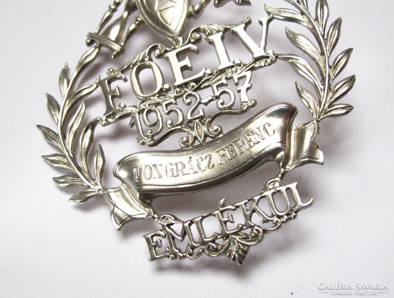 'Capital watch and jewelery company' silver souvenir.