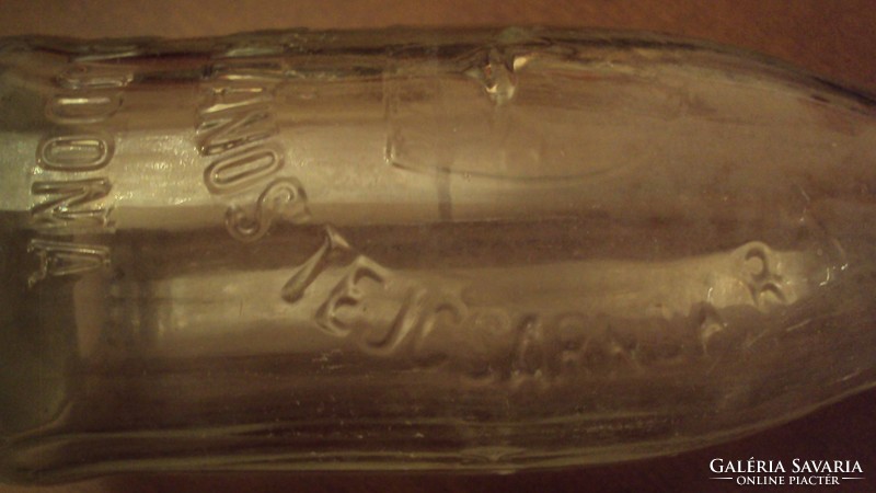 Old thick milk bottle --- embossed lettering with 