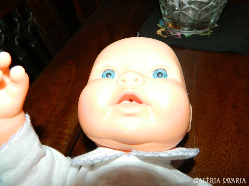 Serial numbered old peeing girl infant doll