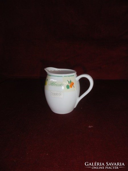 Lowland porcelain milk spout with small floral pattern. He has!