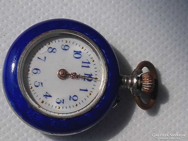 Argent dore, swiss silver pendant watch. With gold decoration on the back.