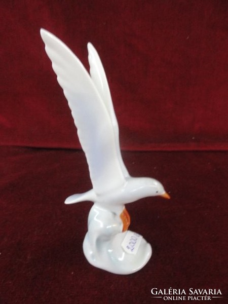 Raven house porcelain figural sculpture with hand painted flying seagull. He has!