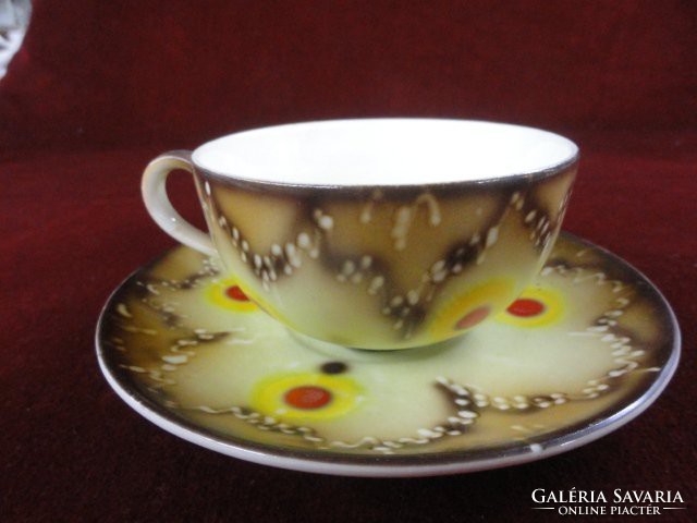 Bihl German porcelain antique tea cup + saucer. On a cream-colored base with a yellow/brown motif. He has!