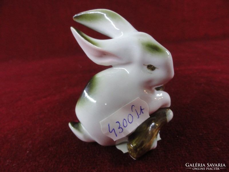 Bunny holding a Zsolnay porcelain tree branch, antique. With beautiful painting. He has!