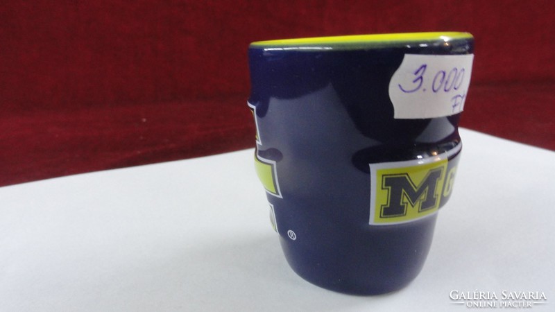 Michigan sports association brandy cup, m go blue. Dark blue outside, yellow inside. He has!