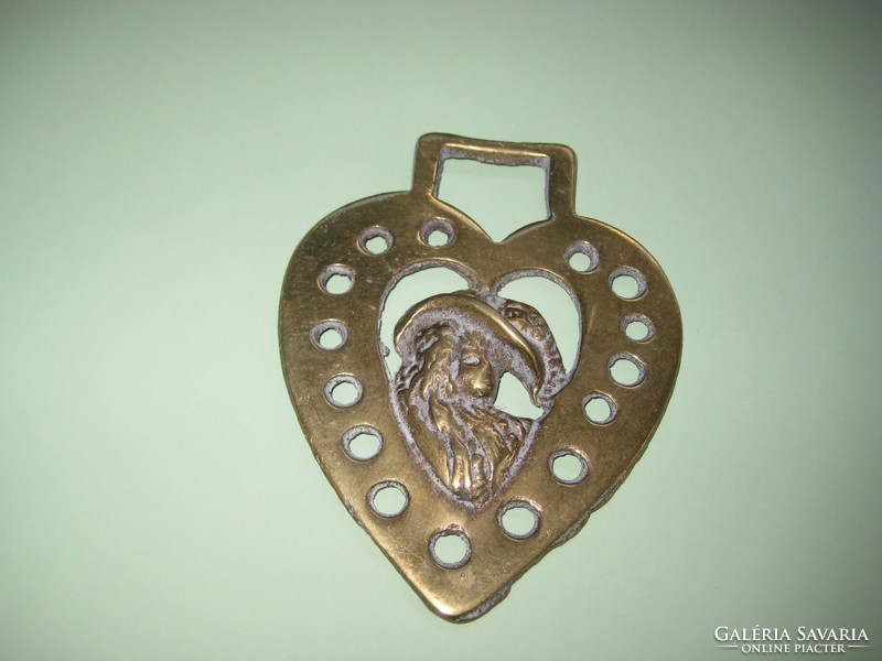 Bronze decoration, leather, horse for tools, with heart decoration