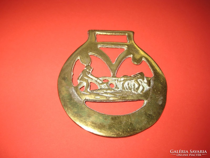Bronze ornament, leather horse for tools, plowing peasant