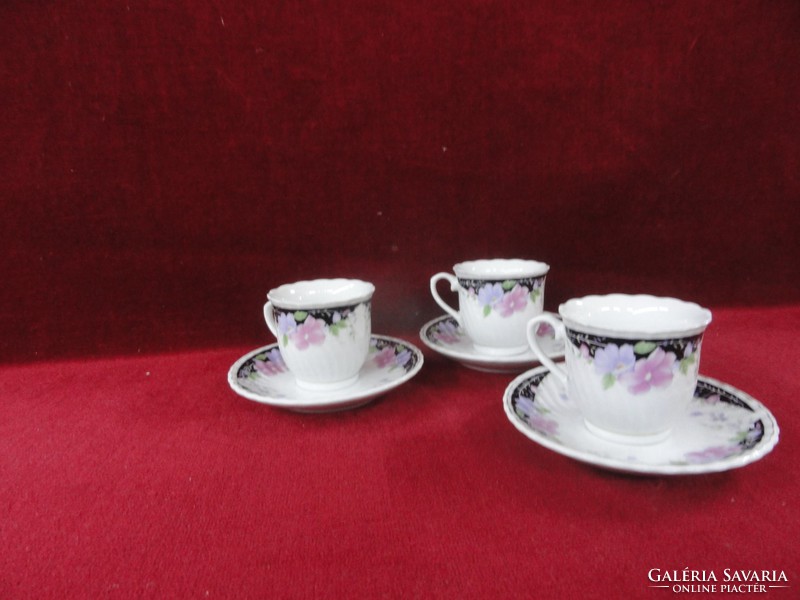 Os Taiwanese porcelain coffee cup + saucer with wavy edges and blue/pink flowers. He has!