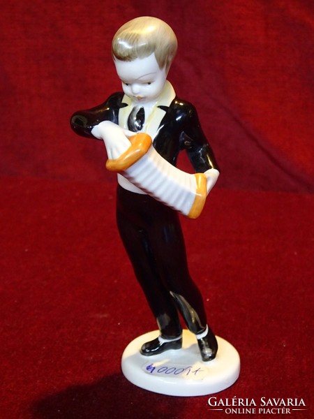 Ravenclaw porcelain figural statue, boy with accordion, in black clothes. He has!