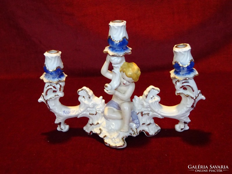 Crown regal fine porcelain three-prong candle holder with putto. He has!