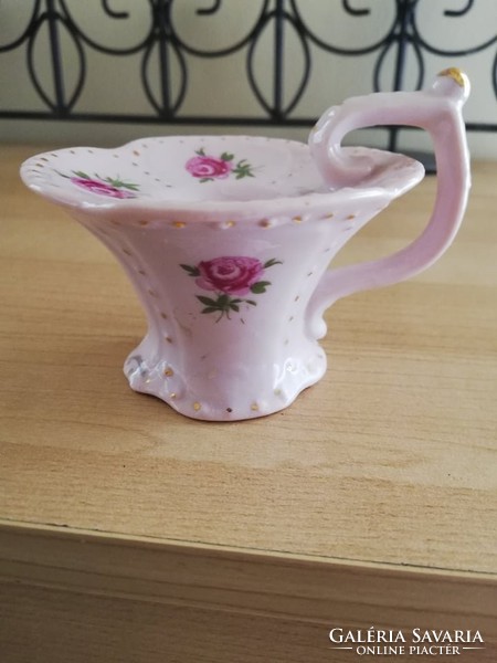 Antique pink porcelain walking candle holder