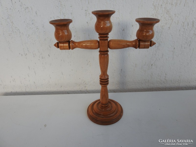 Turned wooden three-pronged table candle holder