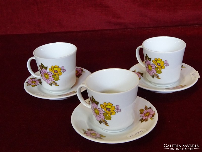 Lowland porcelain coffee cup + placemat. Floral pattern, showcase quality. He has!