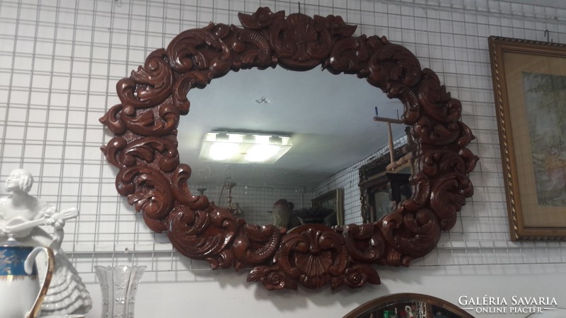 Carved wooden framed mirror