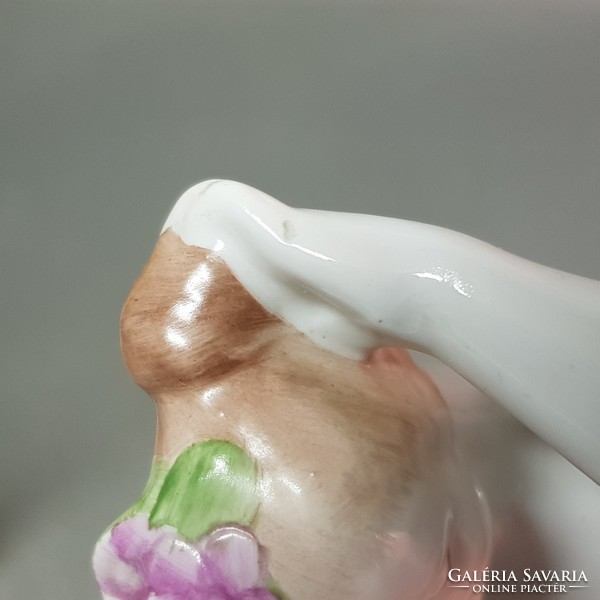 Porcelain figurine of a woman combing an aquincum bun (917)