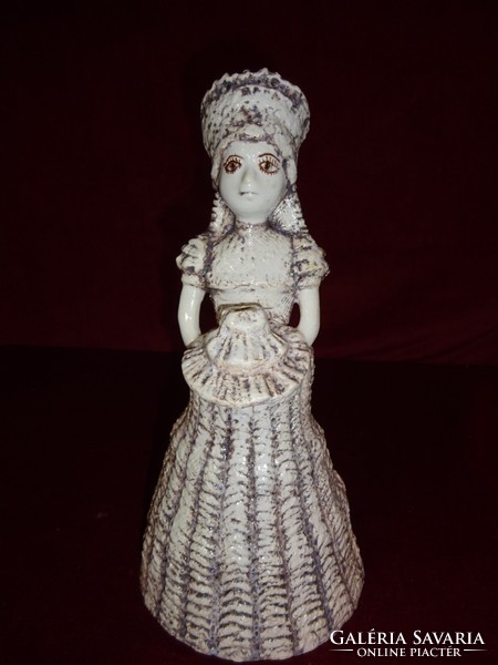 Porcelain figural statue, lady holding a cake, 28 cm tall. Marking inside jm. He has!