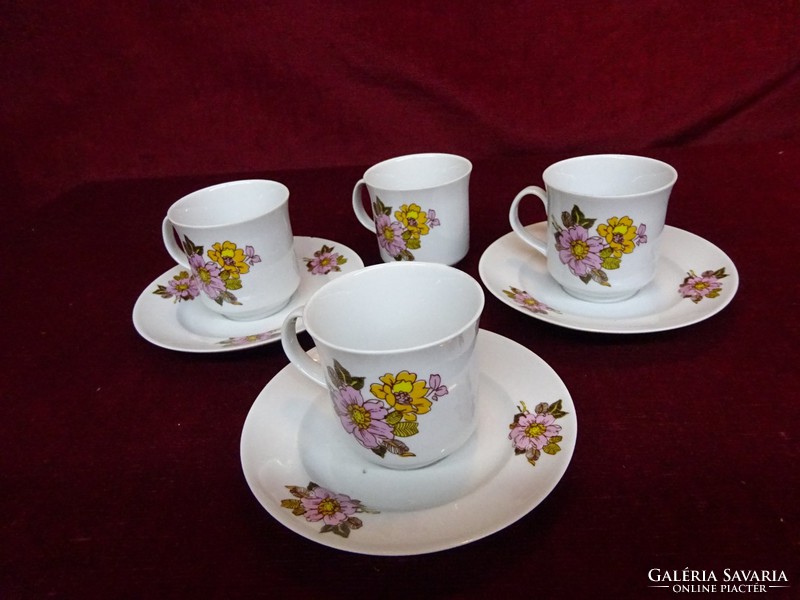 Lowland porcelain coffee cup + placemat. With pink floral pattern. He has!