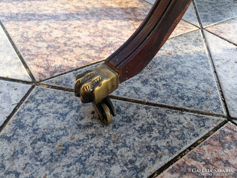Old table with 2 drawers, a graceful piece of copper with lion's claw castors