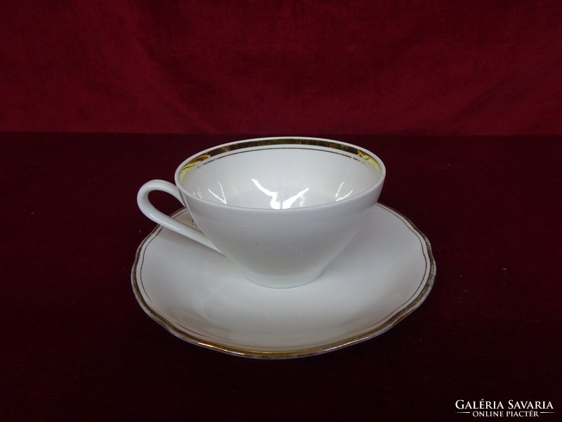 Kahla quality porcelain teacup + placemat. He has!