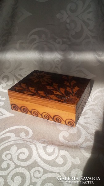 Carved old wooden box with jewelry holder