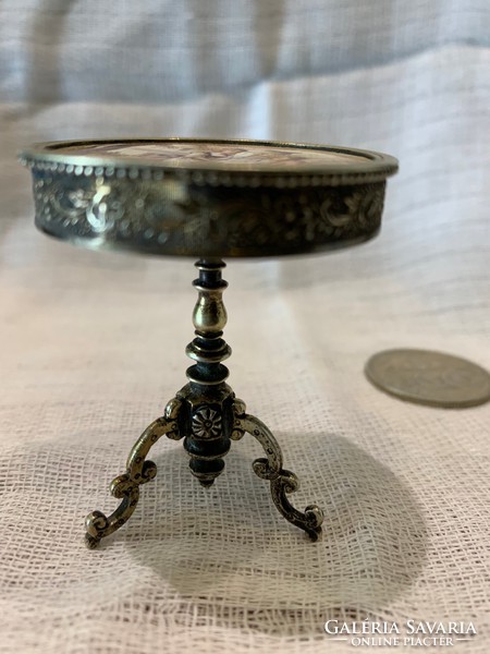 Silver table with porcelain hand-painted scene