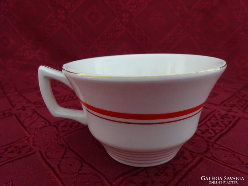 Granite Hungarian porcelain, red striped teacup. He has!