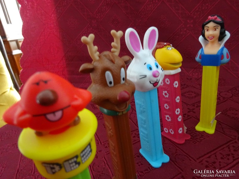 Pez candy dispenser, several kinds of figurines. He has!