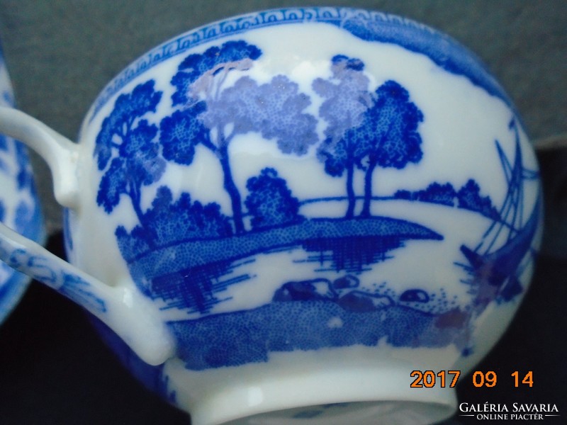 Eggshell with Japanese porcelain tea cup with cobalt blue pattern