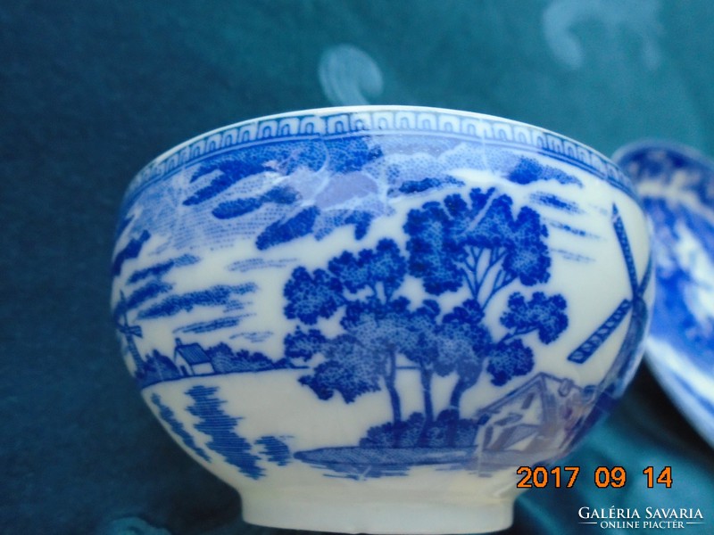 Eggshell with Japanese porcelain tea cup with cobalt blue pattern