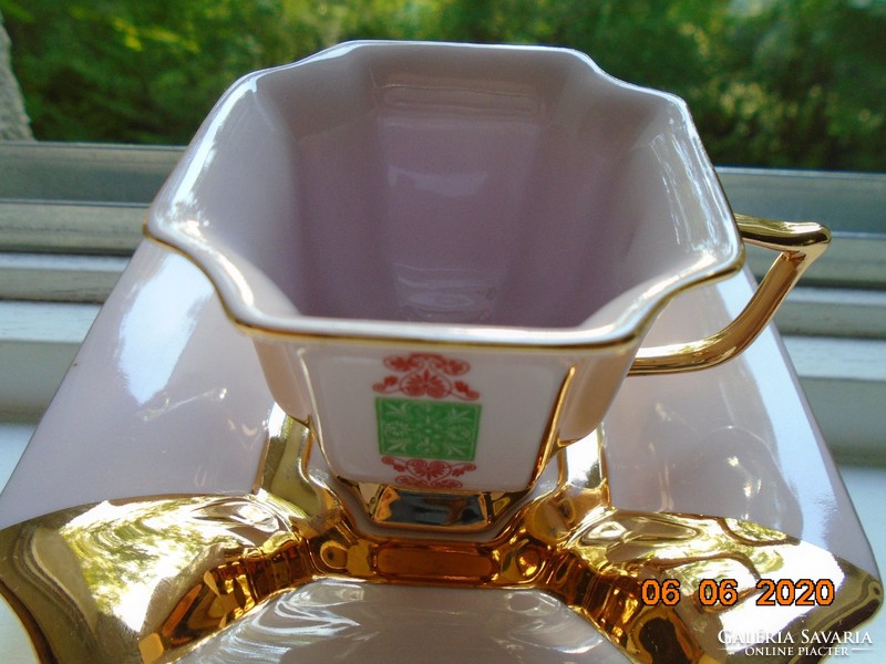 Empire opulently gilded in 8 rectangular materials with a colored pink porcelain cup with a coaster