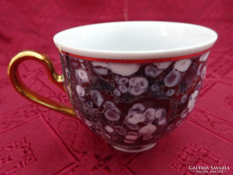 Czech porcelain, hand-painted, rose-patterned coffee cup. He has!