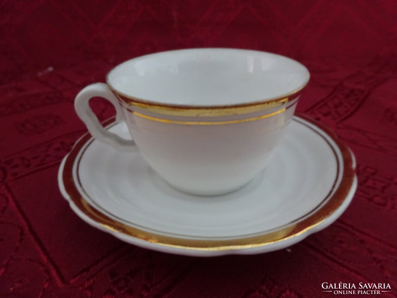 Czechoslovak porcelain coffee cup + placemat with gold trim. He has!