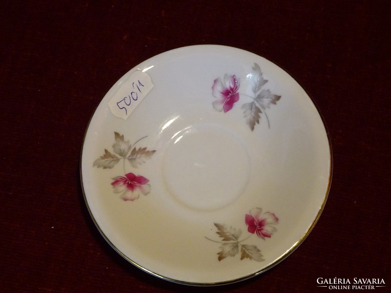 Lowland porcelain coffee cup placemat. Cyclamen flower with gold border. He has!