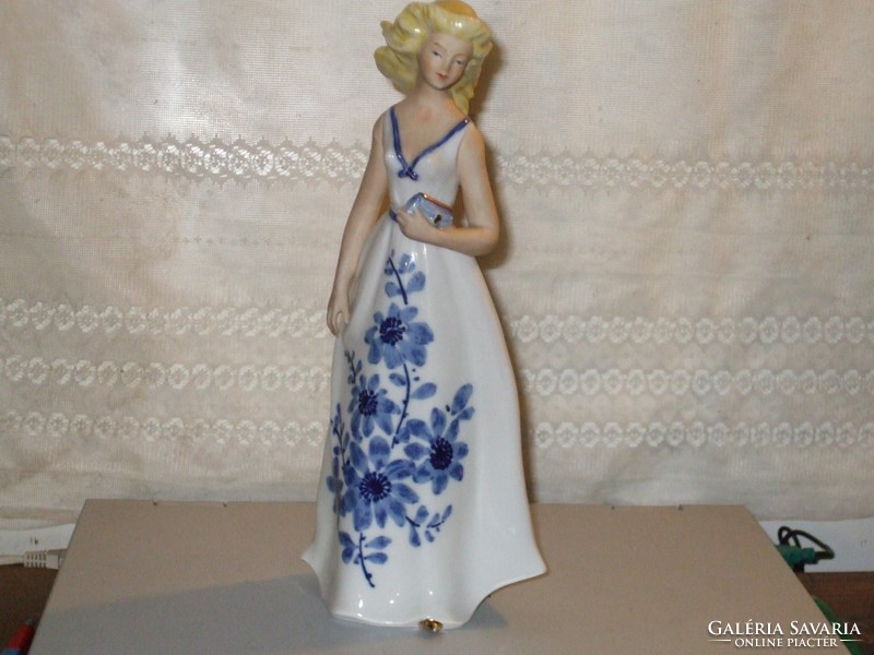 German porcelain lady in cobalt blue dress