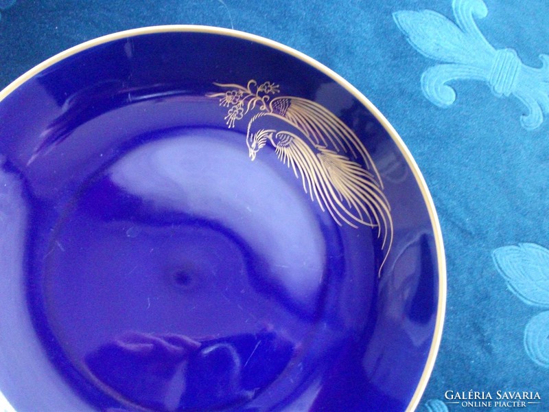Cobalt decorative plate with hand-painted golden bird of paradise