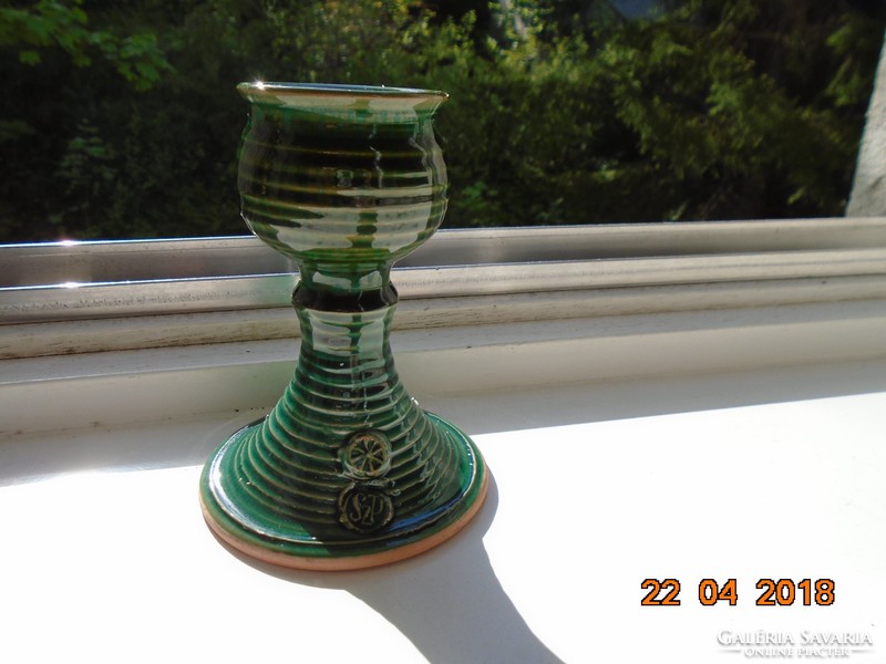 Embossed Hungarian monogrammed green glazed ceramic candle holder