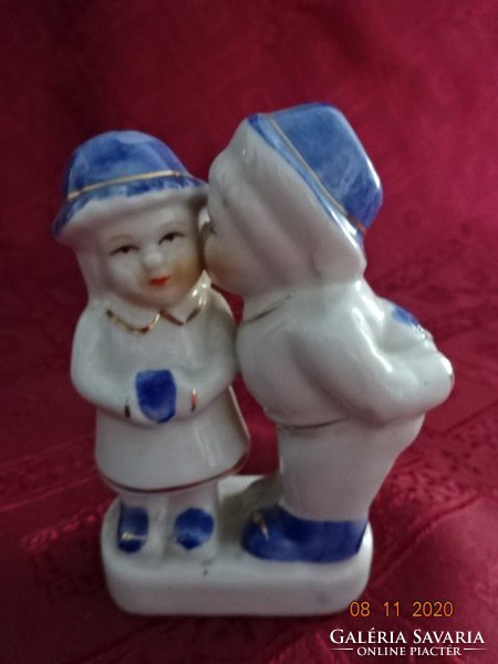 Porcelain figure, boy giving kisses, height 9.5 cm. He has!