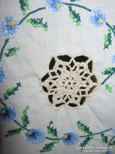 Old embroidered tablecloth with cross-stitch crochet insert