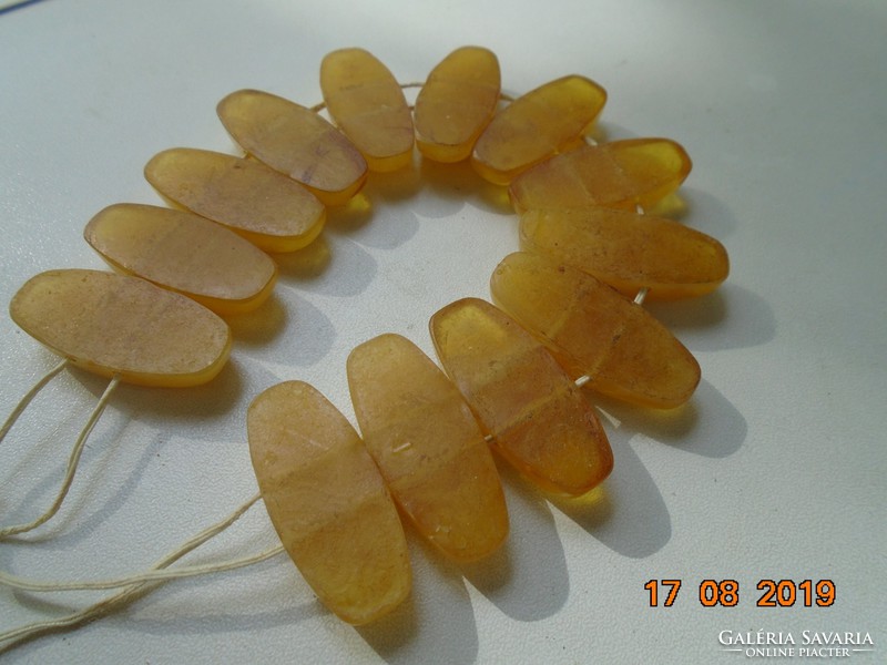 Old amber bracelet with large oval flat beads