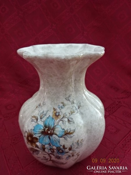 Handmade German ceramic vase. Its height is 17.5 cm. He has!